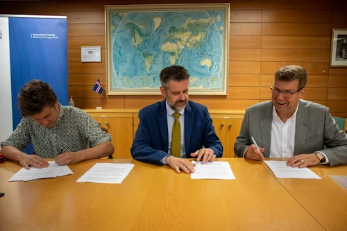 Gústav Arnar Magnússon and Magnús Bjarnason of MAR Advisors with Permanent Secretary of State Martin Eyjólfsson.